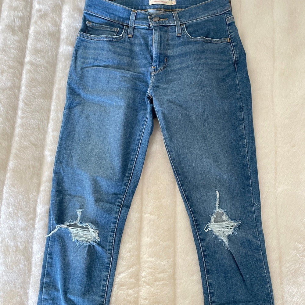 Distressed Blue Jeans
